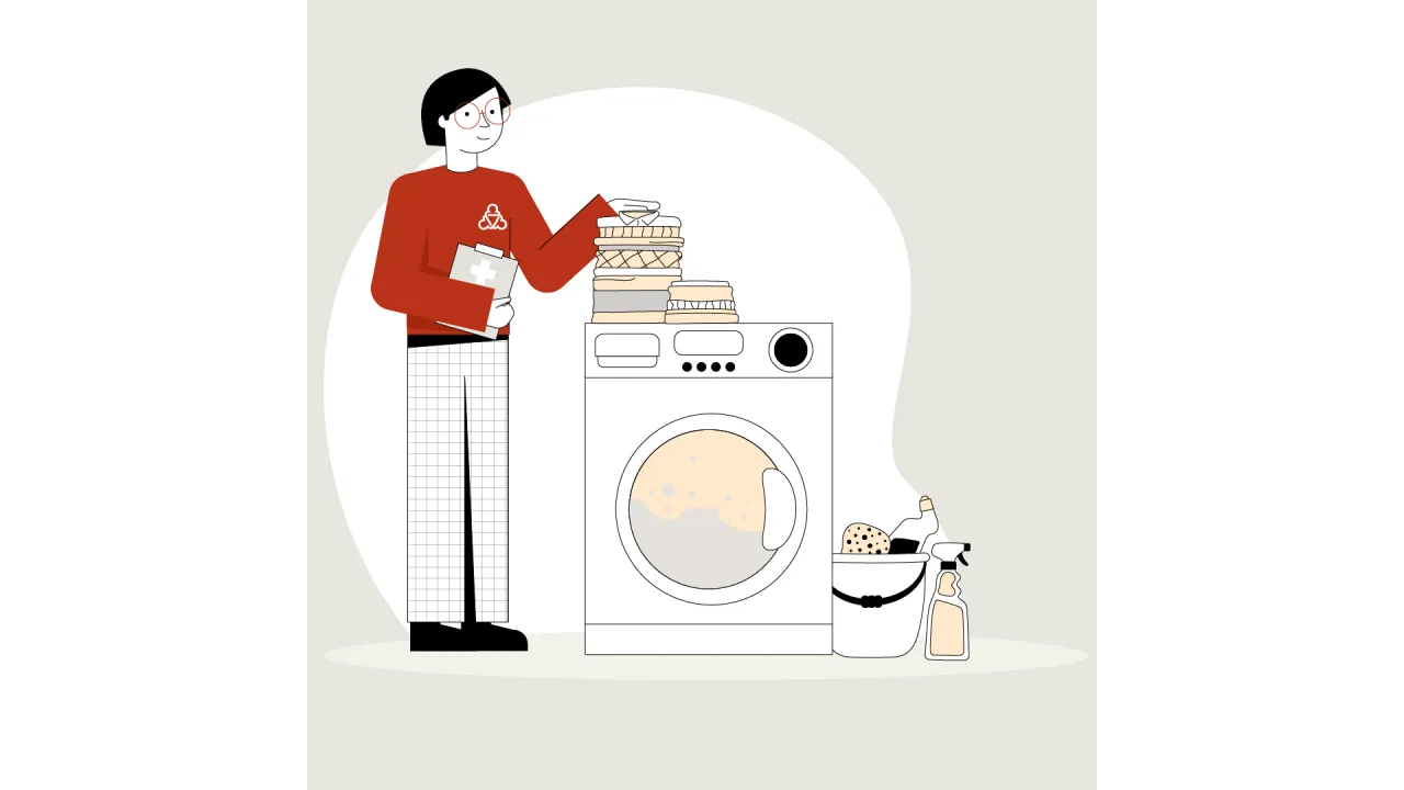 Die Wegweiserin steht an einer Waschmaschine. Es sind ebenfalls Putzmittel zu sehen.